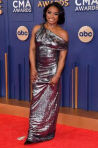 Simone Biles Shimmers in Silver Gown as She Brings Her New Bob to the 2024 CMA Awards Red Carpet