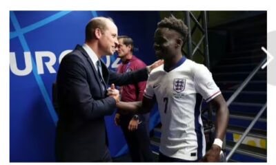 Prince William hugs England goal hero Bukayo saka....